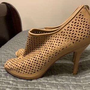 Bootie heels, flux leather, peep toe